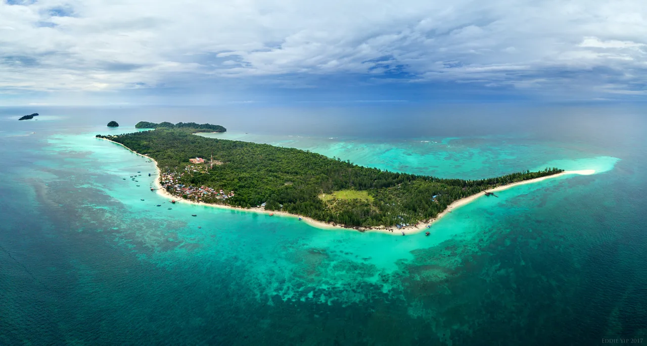 Aerial view of Mantanani Island and its turquoise waters in Sabah.